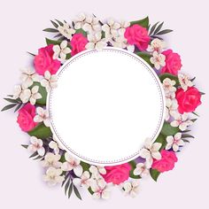 a round frame with pink and white flowers