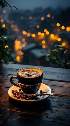 a cup of coffee sitting on top of a wooden table