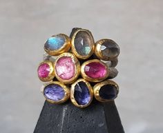 Made to order.. Can be made in any size. Just choose which stone you like best, can be made in any kind of stones..the size of the stones is 7x5 mm, just love to stack them..the 22k gives so much richness to the stones.. The band is made of silver. Ruby And Diamond Necklace, 22k Gold Ring, Black Diamond Earrings, Statement Rings Diamond, Emerald Ring Gold, Yellow Rings, Golden Ring, Colored Stones, Cabochon Ring