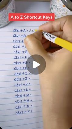 a person is writing on a piece of paper with a yellow marker and a pencil