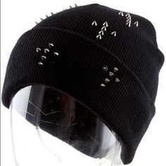 Black Beanie With Gun Metal Cross Spike Studs. Back Of Hat Is Plain Knit Great For Cold Weather And Showing Off Your Rebellious Side! Unisex And Stylish! Trendy Black Knitted Hats, Trendy Adjustable Black Beanie, Trendy Black Adjustable Beanie, Black Knitted Hat For Streetwear, Black Beanie For Fall, One Size Fits Most, Fitted Black Knitted Beanie, Fitted Knitted Black Beanie, Black Punk Beanie Hat, Punk Black Beanie Hat