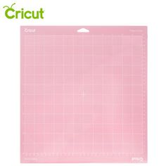 the cricut cutting mat is shown in pink