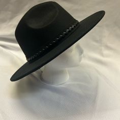 Brand New, Never Been Used. Black Hat Decorated With Woven Leather Strapping. Adjustable Strings Inside For The Perfect Fit. Black Adjustable Felt Hat With Curved Brim, Black Brimmed Hat Band One Size Fits Most, Black Brimmed Hat Band, Black Felt Hat For The Beach, Adjustable Wide Brim Black Felt Hat, Black Felt Hat With Short Brim, One Size, Black Fedora Felt Hat For Beach, Adjustable Black Wide Brim Felt Hat, Black Short Brim Felt Hat For Beach