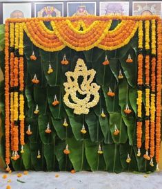 an arrangement of flowers and decorations on display