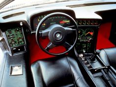 an interior view of a car with dashboard and gauges on the dash board, steering wheel and instrument panel