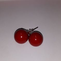 Red Stud Earrings About 1/2 Inch Wide New Without Tags Classic Red Earrings For Party, Classic Red Party Earrings, Classic Red Nickel-free Earrings, Nickel-free Red Earrings For Everyday, Affordable Red Clip-on Earrings, Nickel-free Red Hoop Earrings, Nickel-free Red Round Earrings, Red Stud Earrings, Red Earrings Stud