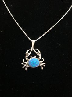 "Blue opal crab necklace /southwestern jewelry /handmade jewelry design /opal necklaces /opal jewelry Stone width: 9mm Stone height: 7mm Chain lengths: 18\" or 20\"" Opal Pendant Necklace With Large Pendant, Opal Cabochon Pendant Necklace, Nickel-free Opal Necklaces As Gift, Unique Oval Opal Necklaces, Nickel-free Opal Necklace Gift, Nickel-free Opal Pendant Jewelry, Blue Opal Nickel-free Jewelry, Opal Round Pendant Jewelry For Gifts, Nickel-free Blue Opal Jewelry