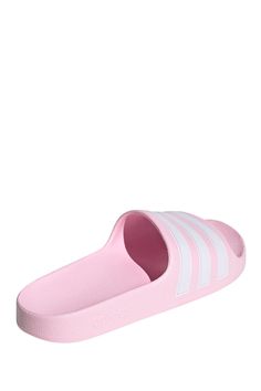 These kids' shower-friendly sandals have a one-piece moulded EVA upper and a plush Cloudfoam footbed that's soft and comfortable on tired little feet. Iconic 3-Stripes show off adidas DNA. . Open toe. 3-stripes print. Slip-on. Molded cushioned footbed. Imported Manmade upper and sole Adidas Slides For Swimming, Pink Non-slip Synthetic Slippers, Pink Slide Slippers For Summer, Adidas Slides For Swimming In Summer, Adidas Slides For Summer Swimming, Pink Synthetic Slippers For The Beach, Pink Synthetic Beach Slippers, Pink Beach Slippers Slide Shape, Pink Beach Slide Slippers