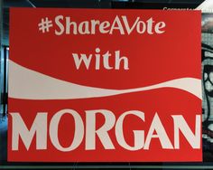 there is a sign that says shareavote with morgan on the side of it