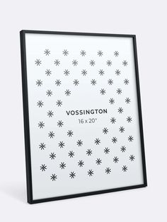 a white and wooden frame with black stars on the bottom that says vosington