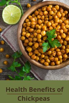 a wooden bowl filled with chickpeas and garnished with cilantro