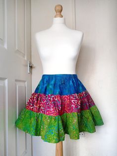 Beautiful, very summe rara style skirt.   Knee length- 45cm drop.  Made by me from beautiful cotton batiks.   The skirt is made of three ruffles, which makes it beautifully flared.   Universal size - fits from size S to L. Comfortable elastic waistband extends from 66cm to 120cm.   It can be worn at the waist or on the hips.   larger and smaller sizes and other lengths and colors are made to order. Rara Skirt, Hippie Rock, Batik Skirt, Hippie Skirt, Hippie Skirts, Skirt Knee Length, Ruffle Mini Skirt, Boho Skirt, Festival Clothing