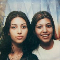 two young women standing next to each other