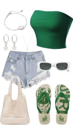 a green top and shorts outfit with sandals