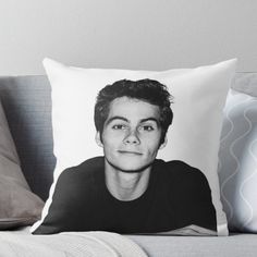 a black and white photo of a man's face on a pillow throw pillow