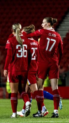 the women's soccer team is congratulating each other