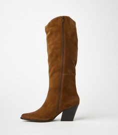 Crafted from soft suede, these pointed toe Western high boots are the perfect addition to any fall wardrobe. Pair them with jeans, skirts, or dresses for a versatile and stylish look that's perfect for the season's colors. With a sleek design and comfortable fit, these boots are a must-have. True to size Upper/Lining: Leather Heel height: 3" Platform: 0.25" Shaft Height: 17" Shaft Circumference: 14.5" Pointed toe shape Full zipper closure at inner ankle Imported Seychelles | Karen Kane Pointed T Wide Calf Suede Boots For Fall, Fall Suede Heeled Boots With Wide Calf, Fall Wide Calf Suede Knee-high Boots, Fall Suede Pointed Toe Boots, Fall Suede Boots With Pointed Toe, Fall Wide Calf Suede Heeled Boots, Suede Heeled Boots With Wide Calf Fit, Brown Suede Heeled Boots For Fall, Fall Suede Knee-high Boots With Pointed Toe