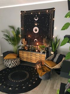 a living room filled with lots of furniture and decor on top of a wooden table