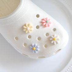 pastel daisy Flower shoe charm designs.  shoe charms   Matte finish 4 designs to choose from or get them all!  modeled on size 6w Cute White Shoe Charms For Summer, Cute White Summer Shoe Charms, Flower Shoes, Shoe Clips, Shoe Charms, Ivory White, Daisy Flower, Florence, Pink Blue