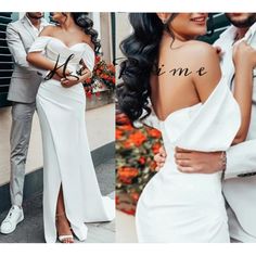 a man and woman standing next to each other in front of a building wearing white outfits