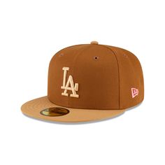 The Union X Los Angeles Dodgers Brown 59FIFTY Fitted Hat features an embroidered Dodgers logo at the front panels with a Union logo at the rear. Additional details include a 1989 Know The Ledge patch at the right-wear side and a green undervisor. Brown Snapback Baseball Cap With Embroidered Logo, Brown Baseball Cap With Embroidered Logo, Six-panel Baseball Hat With Logo Patch, Classic Brown Baseball Cap For Streetwear, Brown Snapback Hat For Baseball Season Streetwear, Vintage Brown Baseball Cap With Embroidered Logo, Throwback College Cap, Classic Brown Hat For Streetwear, Vintage Brown Hat With Logo Patch