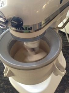 a white mixer sitting on top of a counter