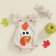 Includes: Romper & BowMaterial: PolyesterGender: GirlsPattern: Turkey FaceSleeve Length: SleevelessSummary: Baby Toddler Sleeveless Ruffled Turkey Face Romper with Matching Bow 2 Piece Thanksgiving Set Turkey Embroidery, Girls Thanksgiving Outfit, Turkey Face, Tummy Time Activities, Girls Thanksgiving, Casual Bodysuit, Backless Bodysuit