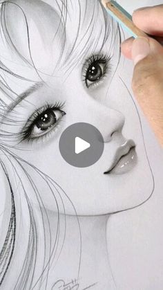 a woman's face is drawn in pencil with the help of a marker on paper