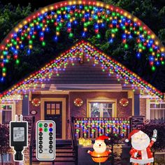 christmas lights and decorations are on display in front of a house