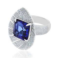 For Sale on 1stDibs - Elegant and Exquisitely detailed White Gold Ring, with a rare 9.1 Cts (approx.) Octagon Shape Cut Tanzanite set in the center beautifully accented with Luxury Gia Certified Baguette Cut Sapphire Ring, Luxury Sapphire Baguette Cut Ring, Luxury Oval Sapphire Ring With Pave Setting, Fine Jewelry Sapphire Ring With Pave Setting, Luxury Tanzanite Emerald Cut Ring, Luxury Tanzanite Diamond Ring With Emerald Cut, Luxury Tanzanite Diamond Ring Gia Certified, Luxury Tanzanite Diamond Ring, Luxury Gia Certified Tanzanite Diamond Ring