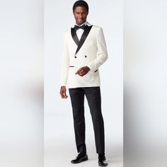 Indochino Slim Fit Ivory And Black Tuxedo Nwt 36r Jacket Shoulders 17 Sleeve Length 24 Bicep 15.5 Chest 38 Waist 35.5 Hip 37 Jacket Length 27.5 Pants Waistband 31 Hip 38.5 Thigh 24 Knee 16 Foot Opening 13 Inseam 29.5 Questions Welcomed Fitted White Suit For Winter, Winter White Fitted Tuxedo, Classic Off-white Formal Outerwear, White Winter Suits For Formal Occasions, Tailored White Suits For Winter, Tailored White Winter Suits, White Tailored Blazer For Black Tie Events, Cream Long Sleeve Tuxedo For Formal Occasions, Classic Cream Blazer For Party