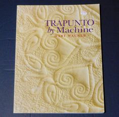 a book with the title traunto d'machine written in purple on it