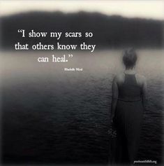 a woman standing in front of a body of water with a quote above her that reads, i show my scars so that others know they can heal