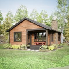 a small wooden cabin with a picnic table in the front yard and landscaping around it