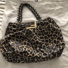 Beautiful Unused Fendi Leopard Print Large Mia Canvas Bag. This Bag Has Been Sitting Unused In Dotage And Is In Perfect Condition. The Bag Offers Braided Shoulder Straps And Gold Embellishments Along With Two Interior Pockets And A Zip Up Compartment In The Middle Interior. This Is A Large Roomy Bag. Designer Rectangular Bag In Leopard Print, Designer Leopard Print Travel Bag, Luxury Leopard Print Shoulder Bag With Gold-tone Hardware, Designer Leopard Print Bag For Everyday Use, Luxury Leopard Print Bags For Formal Events, Luxury Leopard Print Shoulder Bag With Double Handle, Elegant Bag With Leopard Print And Gold-tone Hardware, Elegant Leopard Print Bag With Gold-tone Hardware, Elegant Leopard Print Bag With Double Handle