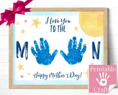 a blue handprinted mother's day card with the words i love you to the moon