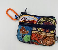 "This 100% cotton pocket wallet has two zippers for easy division between money. Fits standards credit cards. De-tachtable carabiner included. Great gift and accessory for any fan! Size 4.5\" W X 3.25\" T" Emotionally Stunted, Aesthetic Wallet, Granola Outfits, Wallet Keychain, Inside My Bag, Cute Wallets, Pocket Wallet, Granola Girl, Zipper Wallet