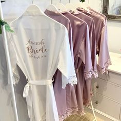 💕One of our best Seller's !💕 You can see why these beautiful satin robes are so popular with either super sparkly glitter or mirror foil writing . These robes are above the knee with a pretty lace edging on the sleeves and along the bottom, they are a matte satin and have a inner tie as well as a outer tie belt. Sizes are ... Standard...fits sizes 8-16 Plus size....fits sizes 16-20 Large choice of robe colours plus a variety of glitter/ foil colours to compliment the robe perfectly. PLEASE LEA Pink Satin Finish Robe For Wedding, Elegant Pink Bridesmaid Robe, Pink Dressing Gown, Lace Robes, Bridesmaid Robe Personalized, Bridesmaid Satin, Satin Robes, Wedding Robes, Silky Robe