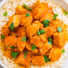 a white bowl filled with chicken and rice