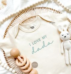 Embroidered I love my dada Baby Onesies®, husband pregnancy announcement, pregnancy announcement onesie®,Baby Christmas Gift Perfect newborn, hospital outfit or baby shower gift!! HOW TO ORDER-------- 1) Choose Color & size  2) Choose Thread Color NATURAL DETAILS---- -Gerber Brand Premium Onesies® -2 snap closure on bottom -cotton interlock fabric -CPSIA compliant WHITE DETAILS---- -soft polycotton blend -3 snap closure on bottom -CPSIA compliant -Short sleeves HAT & Accessories NOT INCLUDED Shipped from our small business here in the USA! Please see size chart for measurements. ©Croissant Label, All Designs and Pictures are copyrighted and may not be used without permission. Pregnancy Announcement To Husband Christmas, Pregnancy Husband, Baby Christmas Gift, Announcement Photos, Announcement Pregnancy, Baby Announcement Photos