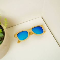 Bamboo Sunglasses + Travel Storage Box- Accessories Daffodil & Alder Blue Sunglasses For Summer Travel, Trendy Blue Sunglasses For Travel, Cleaning Detergent, Bamboo Sunglasses, Box Building, Box Roses, Blue Lens, Travel Box, Curated Gift Boxes