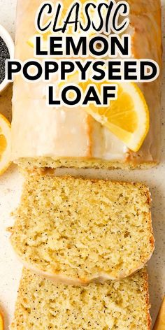 lemon poppy seed loaf sliced and sitting on a cutting board with orange slices around it