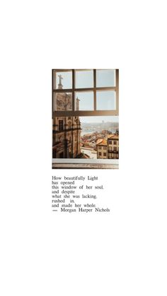 an open window with the words, how beautiful light shines through it and there are buildings in the background