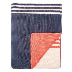 a blanket with two different colors and stripes on the bottom, one in blue and orange