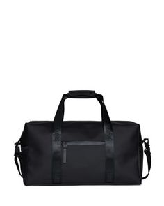 a black duffel bag with straps and handles on the bottom, in front of a white background