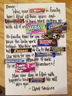 a piece of paper with writing on it and candy bar wrappers attached to it