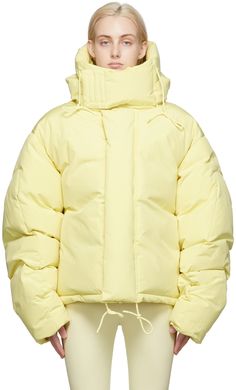 Long sleeve down-filled canvas jacket in yellow. · Concealed zip closure · Velcro placket · Welt pockets at waist · Adjustable hem · Zip pocket at interior · Fully lined · Tonal hardware Supplier color: Blonde Fill: 90% duck down, 10% duck feather. Nike Puffer Jacket Vintage, Yellow Puffer Jacket, Entire Studios, Oversized Puffer, Puff Jacket, Standing Collar, Jacket Parka, Duck Down, Jacket Design