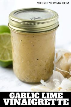 an image of garlic lime vinaigrette sauce in a mason jar with text overlay