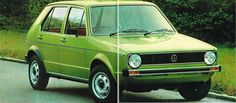 an old green car is parked on the side of the road in front of some trees