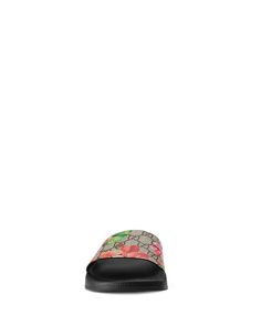 Bold, floral, and utterly feminine, Gucci Bloom slides are the embodiment of elevated casual. From the shore to the city, they're the perfect sandal for relaxed summer days..Available in full sizes only.GG supreme and feline floral print canvas open toe slide sandal with molded rubber footbed.Upper: leather; lining/sole: polyurethane.Made in Italy.Web ID: 1545014 Gucci Bloom Slides, Gucci Shoes Women, Gucci Bloom, Pool Slide, Elevated Casual, Gucci Shoes, Personal Shopping, Pool Slides, Summer Days